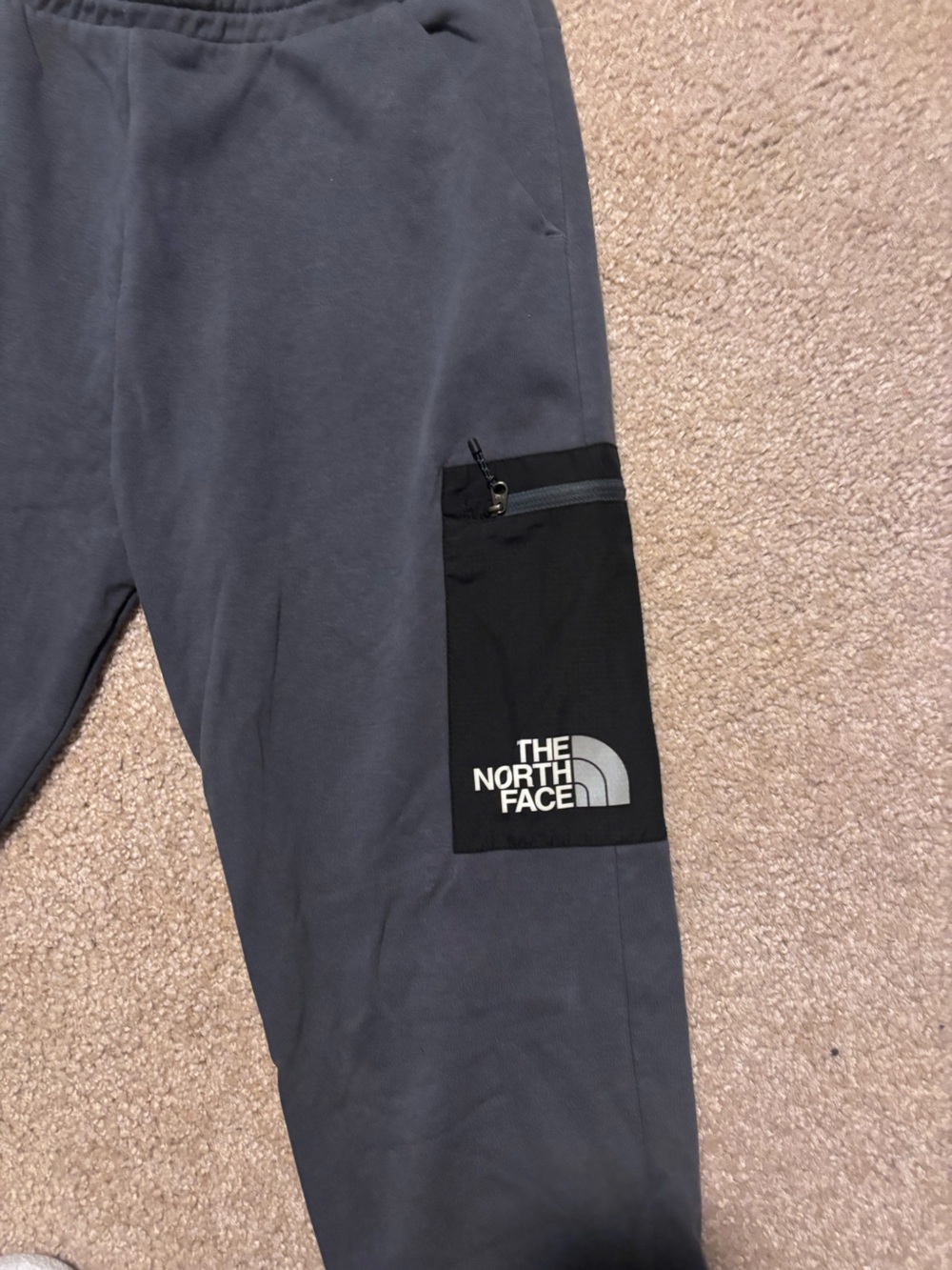 The North Face Men's Gray Joggers with Black Logo Pocket